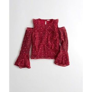 Ruffle cold shoulder top